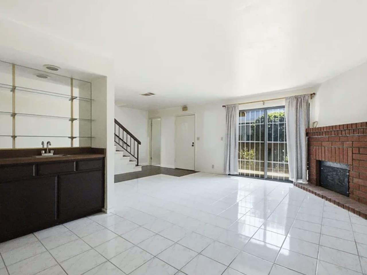 Empty living room listing photo before staging